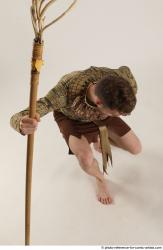 KEETA KNEELING POSE WITH SPEAR